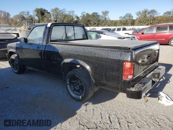 1988 Dodge Dakota с VIN 1B7FN64X9JS799773, выставлен на аукционе Copart как лот 75860884 с пробегом 194 505 миль миль и Списание • Salvage title. История ставок и продаж доступна на DreamBid. Изображение 2.