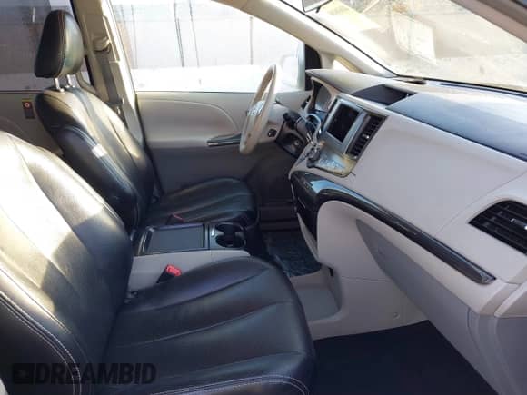 2011 Toyota Sienna SE with VIN 5TDXK3DC5BS064260, listed as a IAAI auction lot 41616160 with 98,505 mi miles and . Bid and sale history available at DreamBid. Image 5.