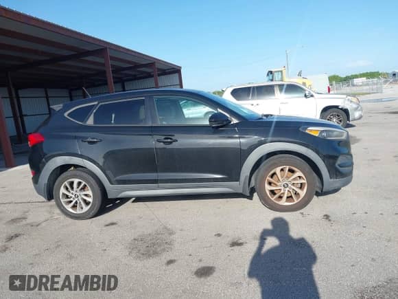 2016 Hyundai Tucson SE with VIN KM8J23A46GU165289, listed as a IAAI auction lot 43059737 with 154,782 mi miles and . Bid and sale history available at DreamBid. Image 13.