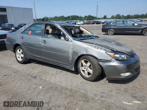 2002 Toyota Camry XLE with VIN JTDBF30K020036770, listed as a Copart auction lot 67023045 with Not provided miles and Salvage title. Bid and sale history available at DreamBid. Image 4.