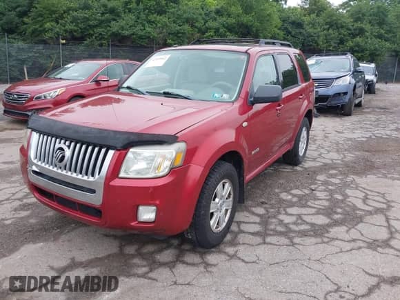 2008 Mercury Mariner with VIN 4M2CU91118KJ10501, listed as a IAAI auction lot 42459842 with Not provided miles and . Bid and sale history available at DreamBid. Image 2.