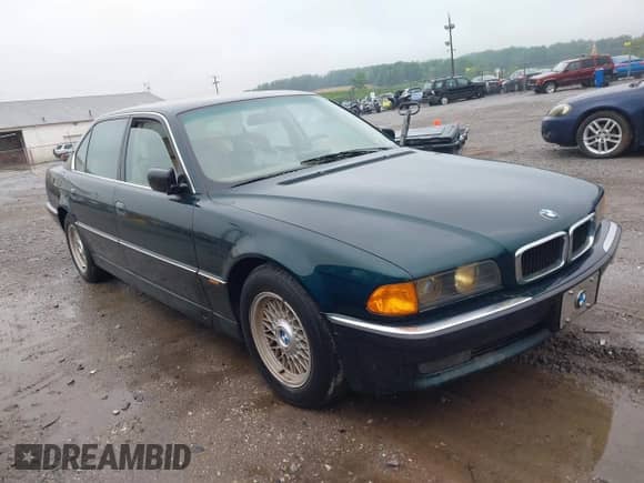 1998 BMW 7 Series 740iL with VIN WBAGJ8329WDM12908, listed as a IAAI auction lot 42255872 with 147,517 mi miles and . Bid and sale history available at DreamBid. Image 1.