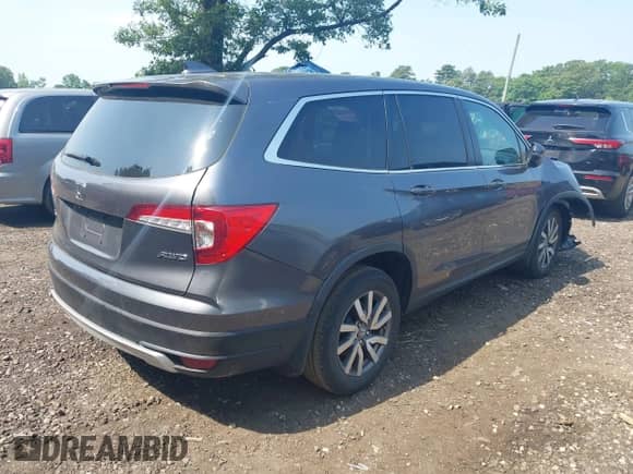 2020 Honda Pilot EX-L z VIN 5FNYF6H59LB029961, wystawiony jako IAAI lot #42552981 z przebiegiem 58 529 mil mil oraz . Historia ofert i sprzedaży dostępna na DreamBid. Obrazek 4.