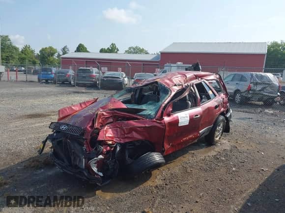 2002 Hyundai Santa Fe GLS with VIN KM8SC73D22U202644, listed as a IAAI auction lot 42754156 with Not provided miles and . Bid and sale history available at DreamBid. Image 6.