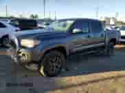 2023 Toyota Tacoma SR5 z VIN 3TMAZ5CN9PM214829, wystawiony jako Copart lot #87104895 z przebiegiem 10 509 mil mil oraz Szkoda całkowita • Salvage title. Historia ofert i sprzedaży dostępna na DreamBid. Obrazek 1.