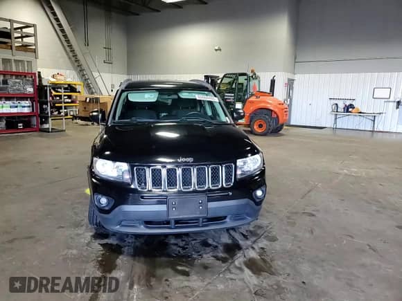 2014 Jeep Compass Sport with VIN 1C4NJDBB9ED842554, listed as a Copart auction lot 69468485 with 124,308 mi miles and Salvage title. Bid and sale history available at DreamBid. Image 14.