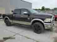 2010 Dodge 2500 SLT with VIN 3D7UT2CL5AG118168, listed as a Copart auction lot 60863934 with 294,747 mi miles and Salvage title. Bid and sale history available at DreamBid. Image 4.