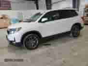 2022 Honda Passport EX-L with VIN 5FNYF8H56NB003932, listed as a Copart auction lot 57431605 with 74,842 mi miles and Salvage title. Bid and sale history available at DreamBid. Image 1.