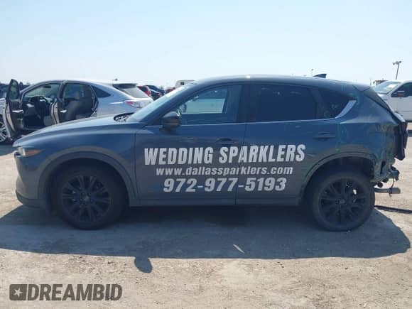 2022 Mazda CX-5 S Preferred with VIN JM3KFBCM9N0529494, listed as a IAAI auction lot 43179890 with 57,495 mi miles and . Bid and sale history available at DreamBid. Image 15.