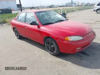 1997 Hyundai Elantra with VIN KMHJF24M1VU506900, listed as a IAAI auction lot 43345670 with 209,590 mi miles and . Bid and sale history available at DreamBid. Image 1.