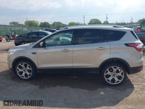 2017 Ford Escape Titanium with VIN 1FMCU9J9XHUD90656, listed as a IAAI auction lot 43216695 with 109,897 mi miles and . Bid and sale history available at DreamBid. Image 14.
