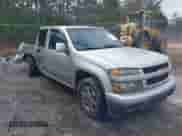 2010 Chevrolet Colorado 1LT z VIN 1GCDSCDE7A8143405, wystawiony jako IAAI lot #41578223 z przebiegiem 158 886 mil mil oraz . Historia ofert i sprzedaży dostępna na DreamBid. Obrazek 1.