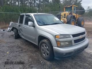 2010 Chevrolet Colorado 1LT z VIN 1GCDSCDE7A8143405, wystawiony jako IAAI lot #41578223 z przebiegiem 158 886 mil mil oraz . Historia ofert i sprzedaży dostępna na DreamBid. Obrazek 1.