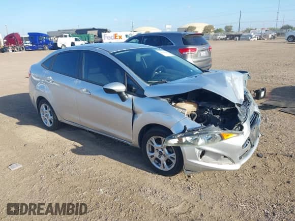 2014 Ford Fiesta SE z VIN 3FADP4BJ9EM139404, wystawiony jako IAAI lot #43090248 z przebiegiem 113 109 mil mil oraz . Historia ofert i sprzedaży dostępna na DreamBid. Obrazek 1.