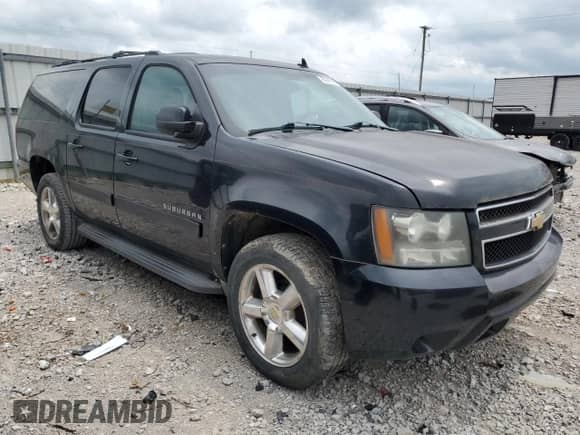 2011 Chevrolet Suburban LS with VIN 1GNSKHE37BR355760, listed as a Copart auction lot 60848905 with 121,065 mi miles and Salvage title. Bid and sale history available at DreamBid. Image 4.