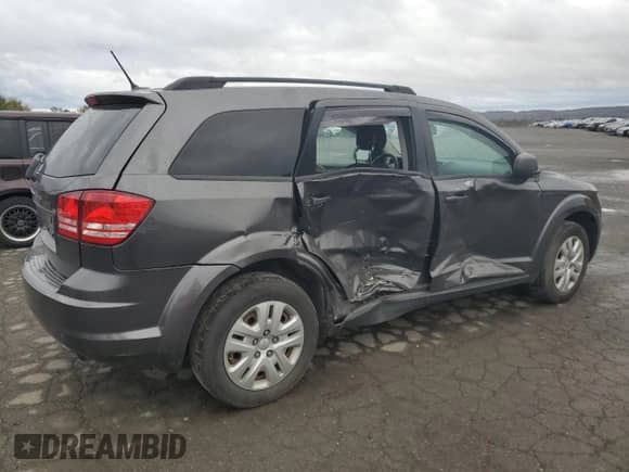 2017 Dodge Journey SE z VIN 3C4PDCAB3HT521944, wystawiony jako Copart lot #87031525 z przebiegiem 84 615 mil mil oraz Szkoda całkowita • Salvage title. Historia ofert i sprzedaży dostępna na DreamBid. Obrazek 3.