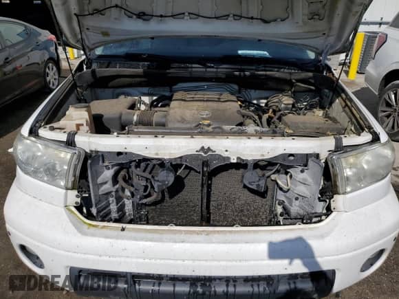 2012 Toyota Tundra Limited z VIN 5TFSY5F13CX128131, wystawiony jako Copart lot #78947464 z przebiegiem 132 206 mil mil oraz Szkoda całkowita • Salvage title. Historia ofert i sprzedaży dostępna na DreamBid. Obrazek 11.