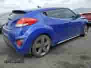 2013 Hyundai Veloster Turbo с VIN KMHTC6AE6DU159195, выставлен на аукционе Copart как лот 70498595 с пробегом 132 896 миль миль и Списание • Salvage title. История ставок и продаж доступна на DreamBid. Изображение 3.