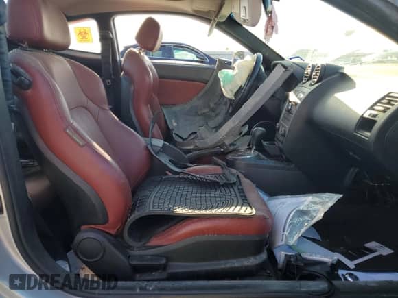 2008 Hyundai Tiburon GT с VIN KMHHN66FX8U283820, выставлен на аукционе Copart как лот 80385934 с пробегом 163 193 миль миль и Списание • Salvage title. История ставок и продаж доступна на DreamBid. Изображение 7.