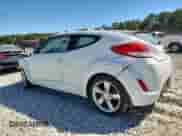 2013 Hyundai Veloster w/Gray Int z VIN KMHTC6AD4DU146162, wystawiony jako Copart lot #84929175 z przebiegiem 143 947 mil mil oraz Szkoda całkowita • Salvage title. Historia ofert i sprzedaży dostępna na DreamBid. Obrazek 2.