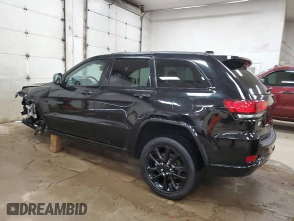 2021 Jeep Grand Cherokee Laredo X with VIN 1C4RJFAG3MC889027, listed as a Copart auction lot 65213615 with 60,459 mi miles and Non repairable. Bid and sale history available at DreamBid. Image 2.