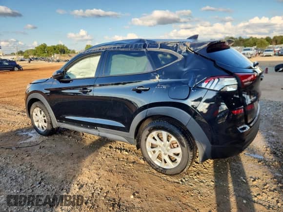 2020 Hyundai Tucson SE with VIN KM8J23A41LU106967, listed as a Copart auction lot 84273005 with 105,162 mi miles and Salvage title. Bid and sale history available at DreamBid. Image 2.