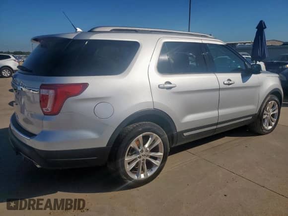 2018 Ford Explorer XLT with VIN 1FM5K7D84JGC54291, listed as a Copart auction lot 71205975 with 104,268 mi miles and Salvage title. Bid and sale history available at DreamBid. Image 3.