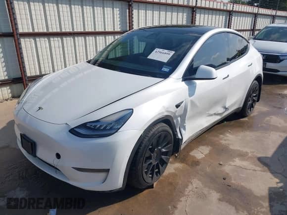 2022 Tesla Model Y Long Range z VIN 7SAYGDEE1NA003346, wystawiony jako IAAI lot #42966899 z przebiegiem 86 422 mil mil oraz . Historia ofert i sprzedaży dostępna na DreamBid. Obrazek 24.