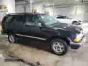 2000 Chevrolet Blazer LT with VIN 1GNDT13WXY2391843, listed as a Copart auction lot 51180375 with 167,159 mi miles and Salvage title. Bid and sale history available at DreamBid. Image 4.