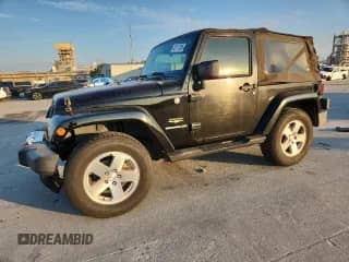 2008 Jeep Wrangler Sahara с VIN 1J8FA54158L589606, выставлен на аукционе Copart как лот 82117285 с пробегом 143 741 миль миль и Чистый • Clean title. История ставок и продаж доступна на DreamBid. Изображение 1.