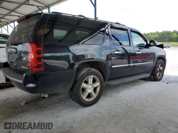 2011 Chevrolet Suburban LTZ с VIN 1GNSKKE33BR303720, выставлен на аукционе Copart как лот 68343425 с пробегом 201 762 миль миль и Списание • Salvage title. История ставок и продаж доступна на DreamBid. Изображение 3.