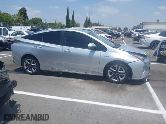 2017 Toyota Prius Two z VIN JTDKARFU0H3042988, wystawiony jako IAAI lot #42580166 z przebiegiem 169 300 mil mil oraz . Historia ofert i sprzedaży dostępna na DreamBid. Obrazek 13.