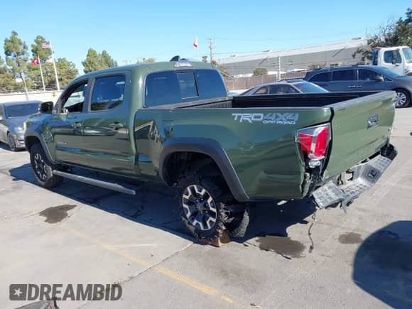 2021 Toyota Tacoma SR5 z VIN 3TMDZ5BN8MM114649, wystawiony jako IAAI lot #43493615 z przebiegiem 63 288 mil mil oraz . Historia ofert i sprzedaży dostępna na DreamBid. Obrazek 3.