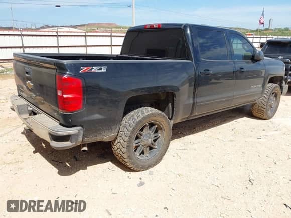 2015 Chevrolet Silverado 1500 LT z VIN 3GCUKREC1FG136452, wystawiony jako IAAI lot #42779167 z przebiegiem 107 813 mil mil oraz . Historia ofert i sprzedaży dostępna na DreamBid. Obrazek 4.