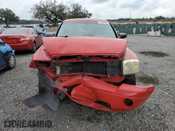 2006 Dodge Dakota SLT с VIN 1D7HE42K86S639143, выставлен на аукционе Copart как лот 64590995 с пробегом 214 618 миль миль и Списание • Salvage title. История ставок и продаж доступна на DreamBid. Изображение 5.