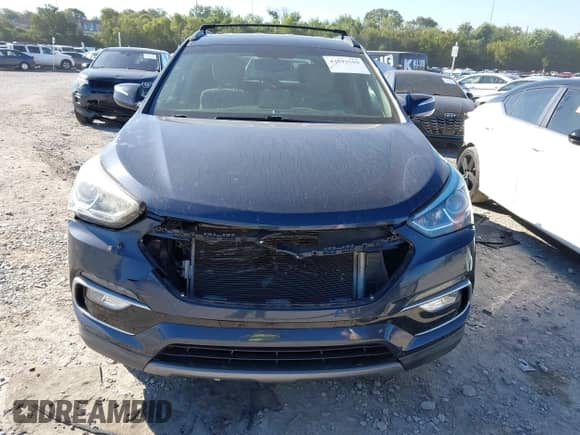 2018 Hyundai Santa Fe 2.4L with VIN 5XYZU3LB1JG529043, listed as a IAAI auction lot 43392559 with 130,820 mi miles and . Bid and sale history available at DreamBid. Image 12.