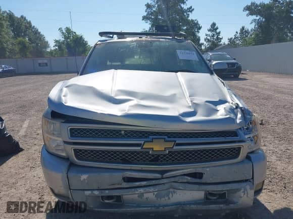 2013 Chevrolet Silverado 1500 LT with VIN 3GCPKSE79DG243009, listed as a IAAI auction lot 42230154 with Not provided miles and . Bid and sale history available at DreamBid. Image 12.