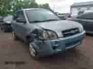 2005 Hyundai Tucson GL z VIN KM8JM12B15U147663, wystawiony jako IAAI lot #42430261 z przebiegiem 191 090 mil mil oraz . Historia ofert i sprzedaży dostępna na DreamBid. Obrazek 6.