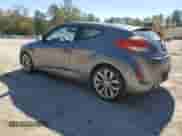 2013 Hyundai Veloster w/Black Int z VIN KMHTC6AD2DU144524, wystawiony jako Copart lot #86604965 z przebiegiem 101 979 mil mil oraz Czysty tytuł • Clean title. Historia ofert i sprzedaży dostępna na DreamBid. Obrazek 2.