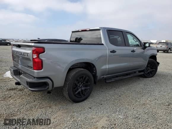 2024 Chevrolet Silverado 1500 Custom with VIN 3GCPABEK2RG394255, listed as a Copart auction lot 82154585 with 8,465 mi miles and Salvage title. Bid and sale history available at DreamBid. Image 3.