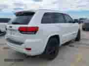 2020 Jeep Grand Cherokee Laredo E with VIN 1C4RJEAG9LC306226, listed as a IAAI auction lot 42839164 with 139,980 mi miles and . Bid and sale history available at DreamBid. Image 4.