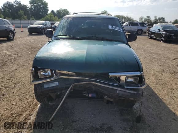 1996 Chevrolet Blazer with VIN 1GNDT13W3T2262402, listed as a Copart auction lot 62677515 with 168,312 mi miles and Salvage title. Bid and sale history available at DreamBid. Image 5.