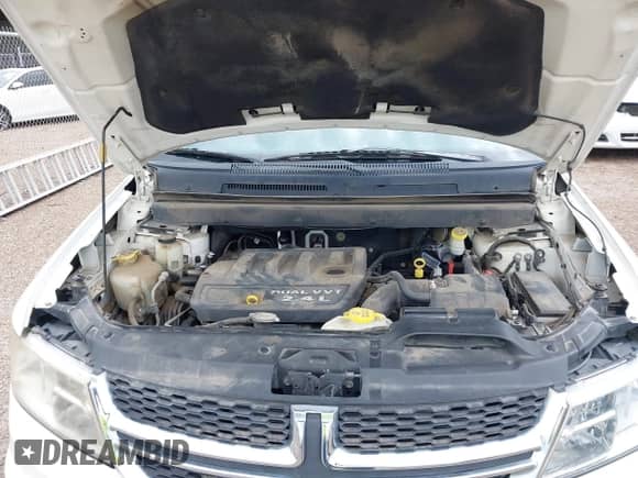 2014 Dodge Journey SE with VIN 3C4PDCABXET194003, listed as a IAAI auction lot 43274470 with 92,895 mi miles and . Bid and sale history available at DreamBid. Image 10.