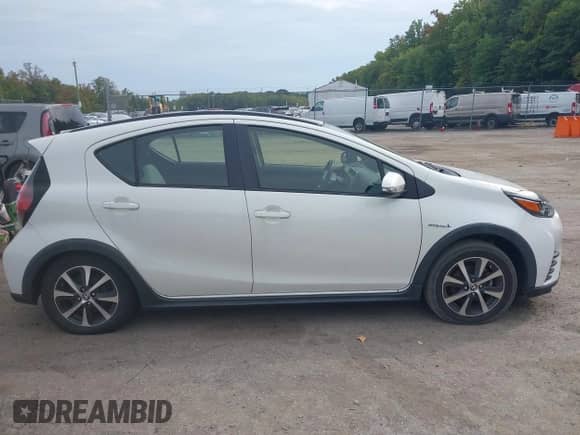 2018 Toyota Prius Four z VIN JTDKDTB33J1599266, wystawiony jako IAAI lot #43318116 z przebiegiem 249 866 mil mil oraz . Historia ofert i sprzedaży dostępna na DreamBid. Obrazek 14.