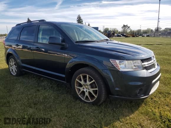 2014 Dodge Journey SXT with VIN 3C4PDCBG7ET191683, listed as a Copart auction lot 85352625 with 184,625 mi miles and Clean title. Bid and sale history available at DreamBid. Image 4.
