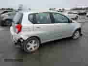 2011 Chevrolet Aveo LS z VIN KL1TD6DE8BB133534, wystawiony jako Copart lot #83668574 z przebiegiem 128 906 mil mil oraz Szkoda całkowita • Salvage title. Historia ofert i sprzedaży dostępna na DreamBid. Obrazek 3.