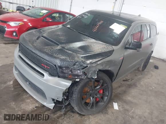 2020 Dodge Durango SRT with VIN 1C4SDJGJ4LC356519, listed as a IAAI auction lot 42777888 with 108,712 mi miles and . Bid and sale history available at DreamBid. Image 17.