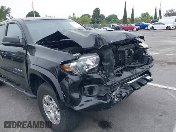 2017 Toyota Tacoma SR5 with VIN 3TMAZ5CN4HM047698, listed as a IAAI auction lot 42465382 with 132,297 mi miles and . Bid and sale history available at DreamBid. Image 6.