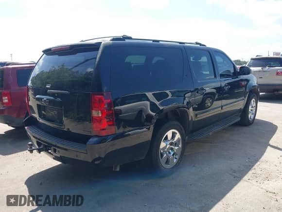 2007 Chevrolet Suburban LT with VIN 3GNFC16057G212162, listed as a IAAI auction lot 42571842 with 233,932 mi miles and . Bid and sale history available at DreamBid. Image 4.