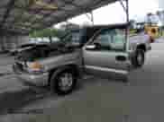 2001 GMC Sierra 1500 SLE z VIN 1GTEK19T31E144505, wystawiony jako Copart lot #85718505 z przebiegiem Nie podano mil oraz Szkoda całkowita • Salvage title. Historia ofert i sprzedaży dostępna na DreamBid. Obrazek 1.